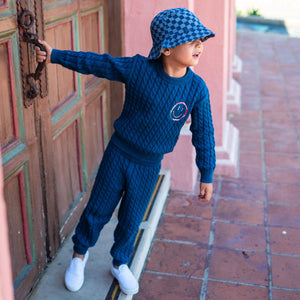 Happy cable knit sweater and pants. 