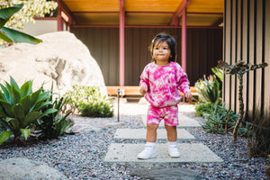 Kids fuchsia pink tie dye sweater and shorts. 