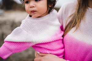 Close up of kids and women's matching dip dye sweater. 