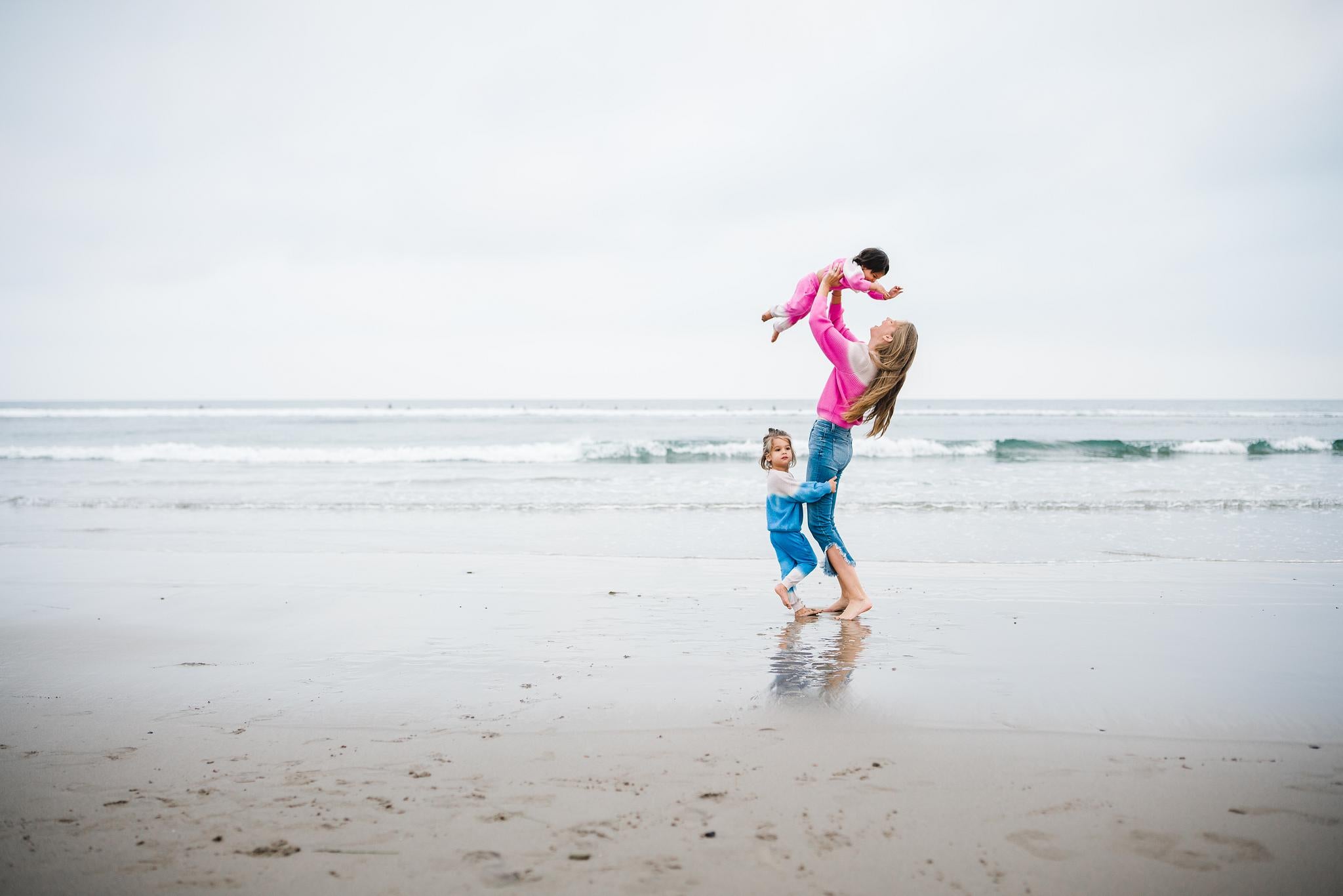 Kids and women's matching dip dye sweater and sweatpants in blue and pink.