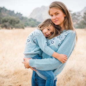 Kids and women's matching chambray blue bandana pattern sweater. 